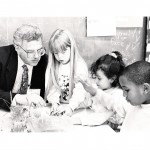 Bruce explaining energy and light to Spring Valley School first graders Casey Harper, Justina Cardenas and Jamal Parsons, for the UCSF SEP program, while Biochem Department Chair, 1992.