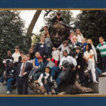Dr. Alberts with visiting schoolkids at the Einstein statue in D.C.