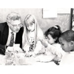 Bruce explaining energy and light to Spring Valley School first graders Casey Harper, Justina Cardenas and Jamal Parsons, for the UCSF SEP program, while Biochem Department Chair, 1992. Bruce explaining energy and light to Spring Valley School first graders Casey Harper, Justina Cardenas and Jamal Parsons, for the UCSF SEP program, while Biochem Department Chair, 1992.